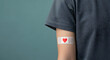 © creative - Arm with plaster and heart, blood cells, donate plasma, world blood donor day, health care, transfusion, Leukaemia disease