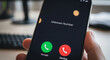 © Asif - Worried about scam calls? Incoming call from unknown number displayed on a smartphone, potential fraud or telemarketing concept with a modern device