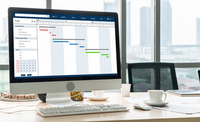 Wall Mural - Project planning software for modish business project management on the computer screen showing timeline chart of the team project