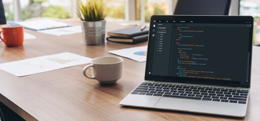Software development programming on computer screen for modish application and program coding