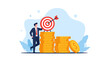 © Tahomina - Businessman achieving financial goals with stacked coins and a target board signifying success.