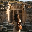 © mhmdyatt - Woman Photographing Ancient Ruins with Camera and Backpack