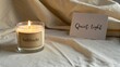 © Shahrimi - Burning candle on white cloth representing a sense of solitude