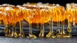 © JovialFox - The image features rich, golden honey slowly dripping and spreading across a dark surface, capturing the fluidity and sweetness of this natural delight.