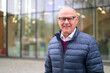 © Ranta Images - Portrait of happy senior man with eyeglasses in the city
