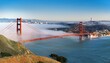 © Cristina - golden gate and the san francisco bay covered by fog the financial district skyline in the background as seen from the marin headlands state park california