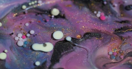 Wall Mural - Oil flow. Bubble liquid. Defocused purple pink blue colorful glitter paint water round mix texture floating on abstract acrylic background.