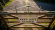 © Herman - Closed Gate With Sign on a Rural Path in Natural Environment Detail View