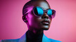 © Agustin - Modern woman in blue suit and reflective sunglasses with pink background