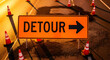 © Desi - Traffic Detour Sign Directs Travelers Away From Road Construction Zone.