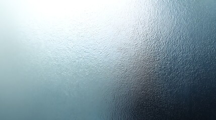 Abstract textured background with a gradient of light blue to dark blue and a frosted glass effect creating a subtle pattern