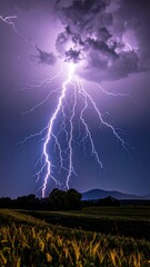 Wall Mural - Dark storm clouds roll over a desert landscape at sunset, casting a dramatic shadow across the sky
