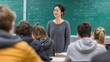 © Evodigger - Female teacher having class in front of blackboard,students sitting behind,copy space,banner.