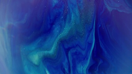 Wall Mural - Dissolving ink. Defocused paint texture. Prism lens blue purple green glitter liquid spreading on abstract background. Blur lens light color glow.