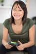 © auremar - young happy woman plays video games