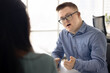 © fizkes - Job candidate man with Down syndrome talking to recruit specialist