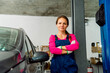 © Barillo_Images - Female car mechanic portrait in auto repair shop
