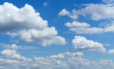 Wall Mural - a beautiful blue sky with soft white clouds for abstract background
