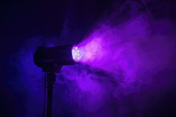 Wall Mural - modern led party light casting purple rays, colorful spotlight moving side to side in a dim space.
