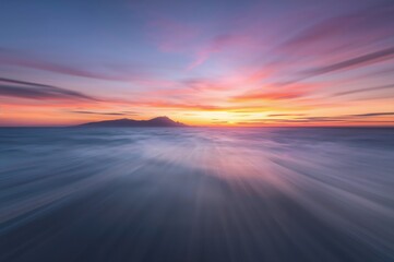 Wall Mural - Blurred motion effect with abstract twilight sky over the ocean