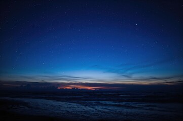 Wall Mural - dusk over the ocean horizon