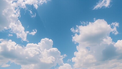 Wall Mural - The sky displays a bright blue hue with scattered white clouds.