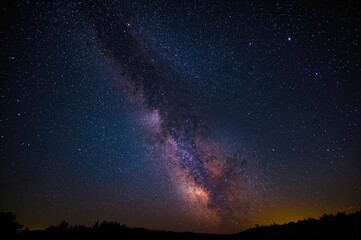 Wall Mural - Night sky filled with stars and the Milky Way galaxy