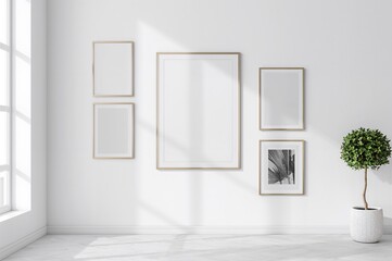 Wall Mural - Minimalist poster design in a contemporary room featuring frames of multiple dimensions