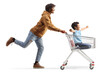 © Ljupco Smokovski - African american guy riding a kid inside a shopping cart