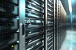 © TommyNa - Modern IT server racks with illuminated blue and green indicator lights in a secure data center, ideal for illustrating cloud technology, network systems, and digital infrastructure