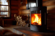 © Artistry - log cabin interior with black wood-burning stove and stacked firewood against rounded timber walls in warm rustic composition