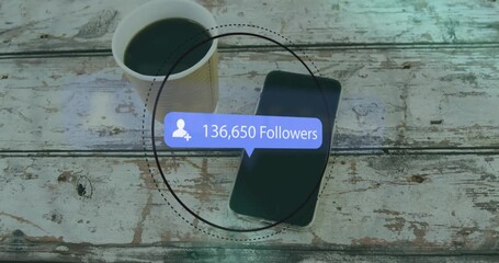 Wall Mural - on startup smartphone showing circle overlay and bubble updating follower counts visualizing growth