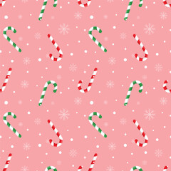 Wall Mural - Christmas seamless pattern with green and red candy canes and winter snowflake isolated on light red background.Merry Xmas vector graphic illustration wallpaper.