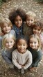 © Oleksandr Pashchenko - A group of children standing in a circle smiling at the camera