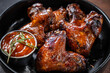 © zukamilov - Grilled chicken wings with spicy tomato sauce