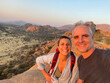 © Juno/Stocksy - Happy travel vacation selfie