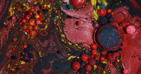 Wall Mural - Color oil blend. Bubble art. Blur red yellow blue ink glitter droplet round texture acrylic wet pigment circle on abstract background.