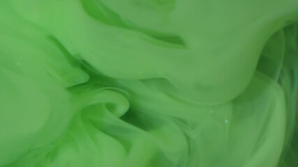 Wall Mural - Cloud blend. Dye spread. Bright color green paint explosion flow. Art fume wave spray abstract blur black sparkling water background.