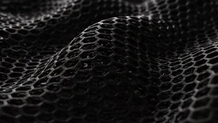 Dark Hexagonal Mesh Surface Abstract Background.