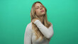 © Krakenimages.com - Woman hand on neck gesture with closed eyes in studio portrait session; stress tension discomfort fatigue.