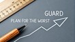 © Haraz - Creative Business Strategy Concept with Pen, Ruler, and Chalkboard Featuring the Phrase 'Guard Plan for the Worst'