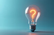 © Vadym - Clear glass lightbulb with glowing question mark inside on blue background. Idea generation and problem-solving concept. Illuminated inquiry symbol for educational or business use.