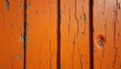 © Vadym - Close up photo weathered orange painted wooden planks with visible cracks and wood grain. Aged surface with texture details. Rustic design and natural material.
