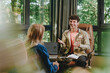 © Westend61 - Businessman and colleague discussing business strategy in office