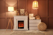 © Pixel-Shot - Interior of cozy room with glowing lamps, dresser and stylish fireplace