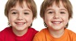 © Crystal Webb - Two smiling children sidebyside one in red the other in orange shirts against a white background