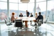© Ольга Лукьяненко - Blurred business meeting with round table discussion in office