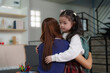 © itchaznong - Tender Moment. Child hugging mother before school departure.
