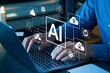 © Din Nasahrudin - Generative AI supporting business processes with intelligent automation technology. Artificial intelligence analyzing data and generating reports. Businessman using laptop computer.