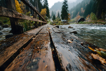 Wall Mural - Rustic Wooden Bridge Over River in Autumn Forest Landscape